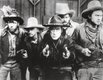 William S. Hart (centre) in "The Gun Fighter," 1917