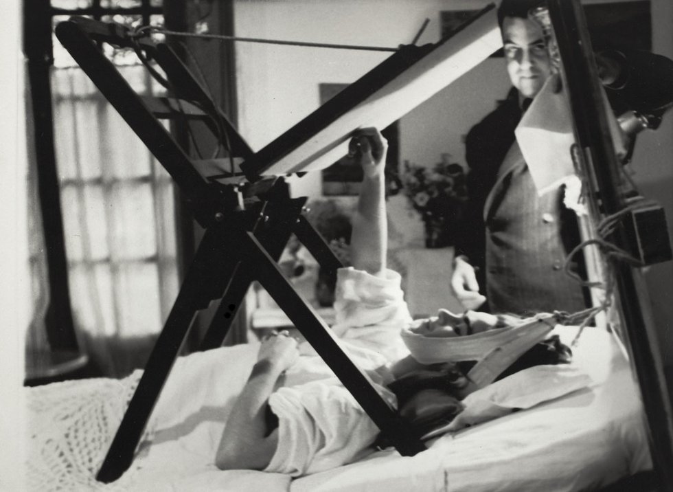 Frida Kahlo painting in her bed, anonymous, 1940 ©Frida Kahlo Museum