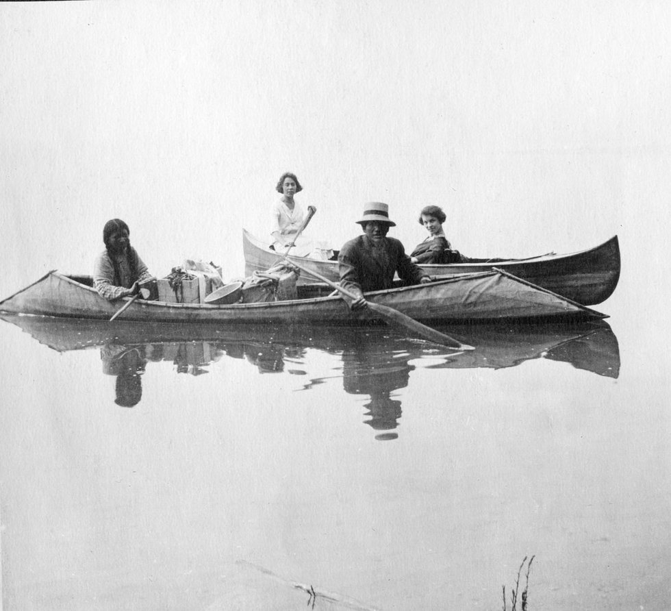 Kootenay Lake First Nations, Summer 1922. Phyllop Peter and his wife in the front boat