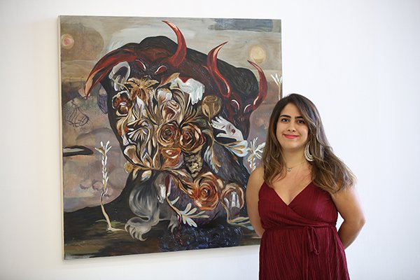 Amanda Boulos with her winning painting "In the Morning," 2017