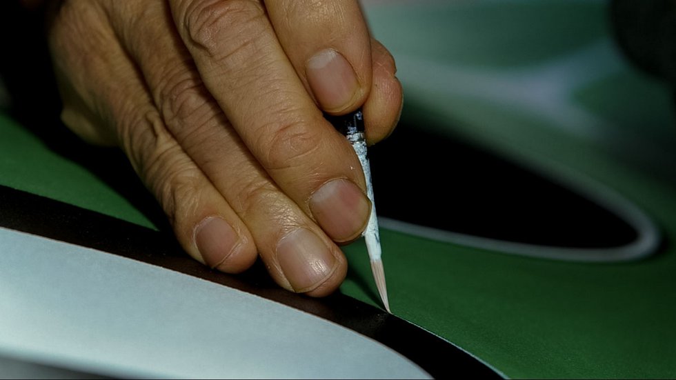 A close-up of Robert Davidson at work. (photo by Tina Schliessler)