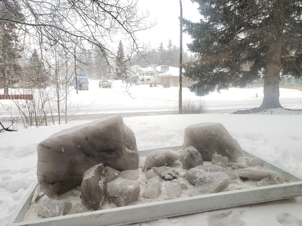 Several chunks of permafrost melt in Leslie Leong’s front yard in Whitehorse. (courtesy of the artist)