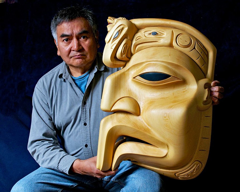 Dempsey Bob with his carving "Eagle Sculpture." (collection of the Audian Museum, Whistler; photo by Graeme Joseph)