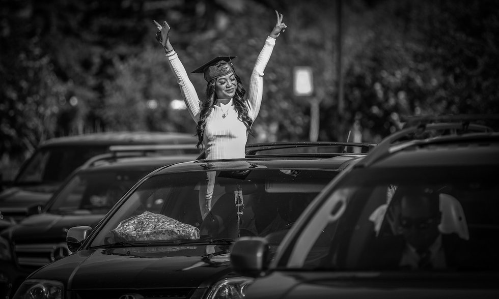 Mount Royal University graduates celebrate during a drive-in-style convocation ceremony on June 7, 2021. (photo by Leah Hennel)