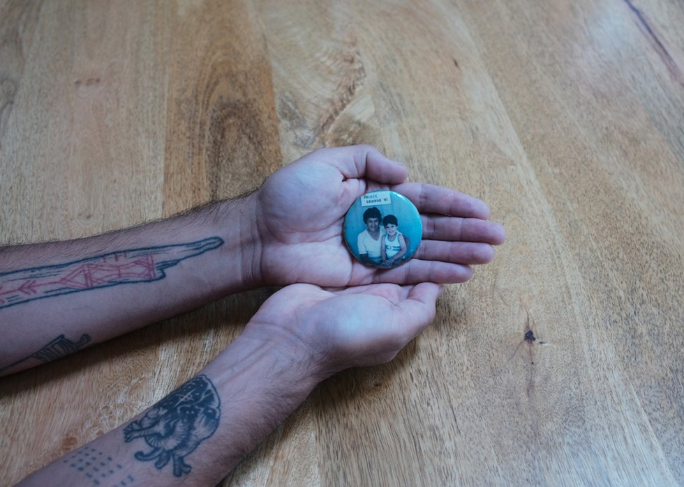 Peter Morin holds a button showing him as a child with his mother, Janell, in Prince George, B.C. (courtesy Peter Morin)