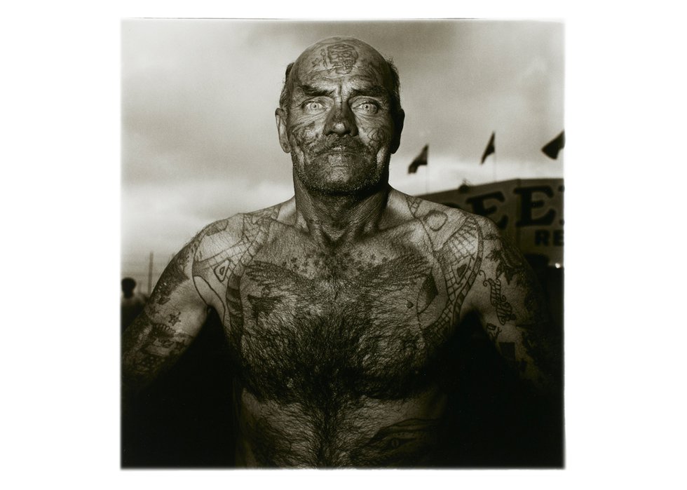 Diane Arbus, “Tattooed man at a carnival, Md.