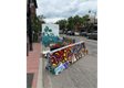 A BUMP Road Works mural on a concrete barrier in Calgary. This one is by artist Adeniji Anjolaoluwa, also known as @macanjy (photo by Richard White)