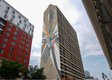 Mirko Reisser (DAIM), "World's Tallest Mural," 2022, mural, Calgary (photo by Janille Delos Reyes)