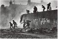 "Catholic youth escaping a CS gas assault in the Bogside, Londonderry"