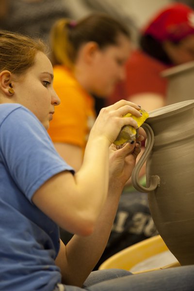 VIU Visual Art student Lucy Bonar works on a project in a ceramics class.