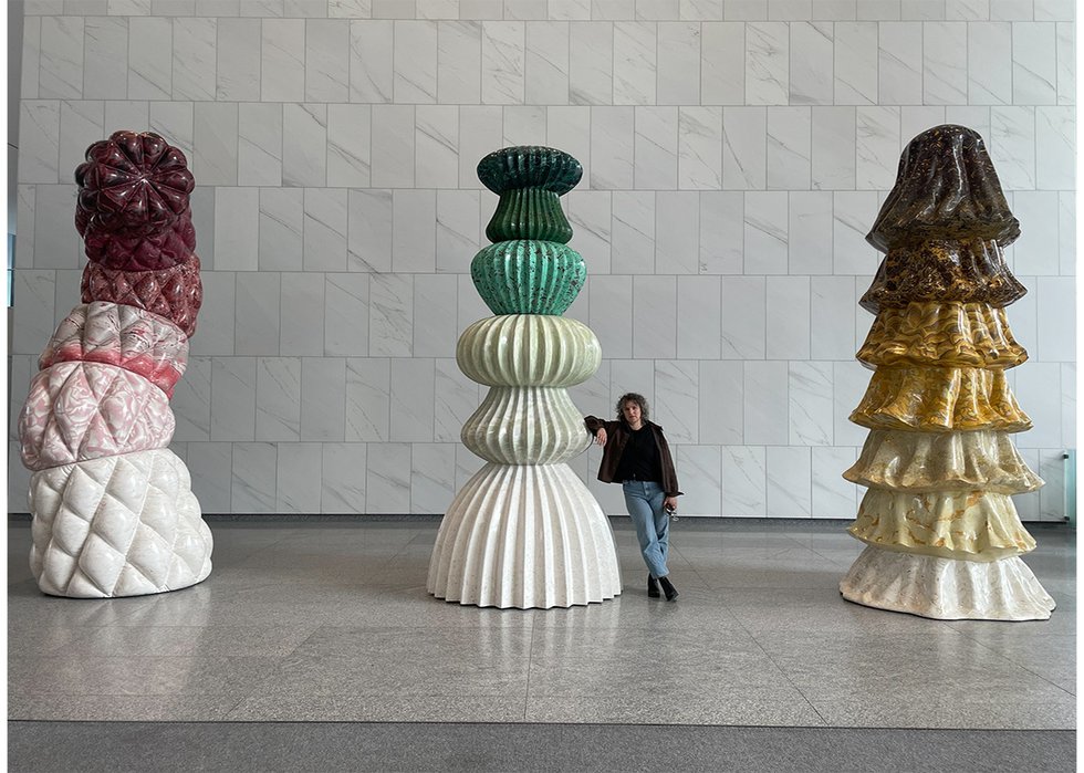 Artist Beth Stuart with her new work, “Les Tendresses,” in the lobby of La Banque Nationale du Canada in Montreal (photo by Rick Leong)