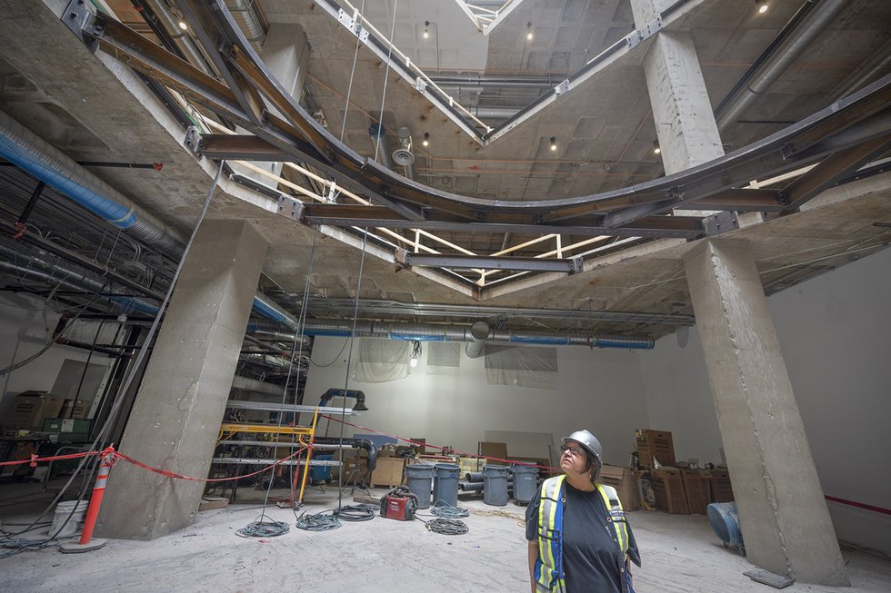 Faye Heavyshield scopes the location of her new sculpture in Glenbow (photo by George Webber)