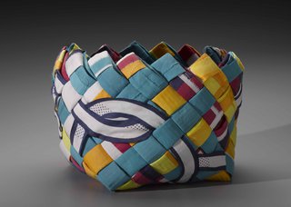 Ed Rossbach, “Rag Basket,” 1972, obliquely plaited commercial fabric and corrugated paper with applied silkscreened cotton plain weave, 8.5" x 11.3" x 11"(courtesy of Museum of Fine Arts, Boston, The Daphne Farago Collection)