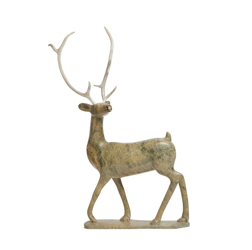 Osuitok Ipeelee, “Striding Caribou,” 1988, stone, antler, 23" x 12" x 3" (sold by Waddington’s for $13,750)